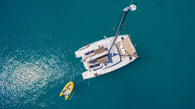 yacht & tender in the whitsundays